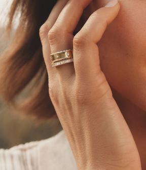 Model wearing a yellow gold Sol ring