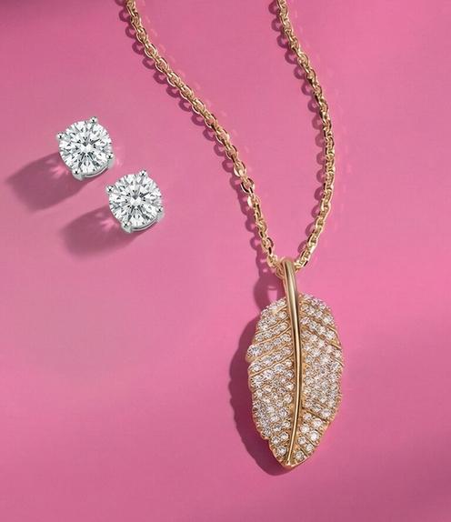 Diamond stud earrings and leaf diamond pendant.