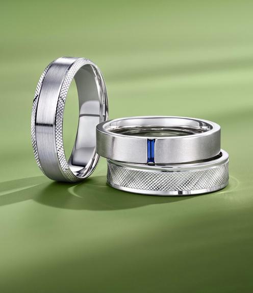 Variety of men's wedding rings.
