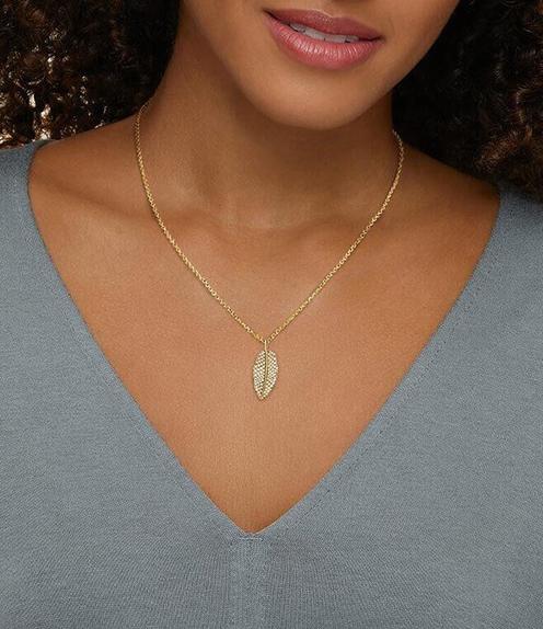 Model wearing a leaf diamond pear shaped pendant